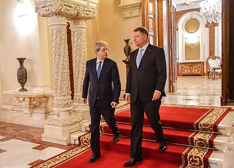 Outgoing Italian Prime Minister Paolo Gentiloni (L) meets with Romanian President Klaus Iohannis at the Cotroceni Palace, the Romanian Presidency headquarters in Bucharest, on April 19, 2018.  (Photo: AFP)