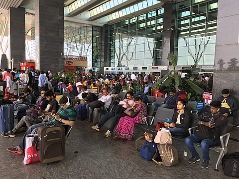 People stranded at Bengaluru International Airport. (Nagaraja Gadekal | EPS)