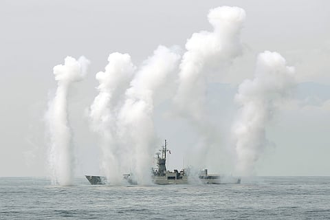 A Taiwan Navy's Knox-class frigate fires chaff during a navy exercise | AP