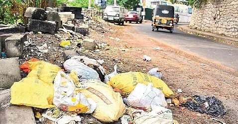 Waste piling up on the roadside in Thiruvananthapuram  B P Deepu