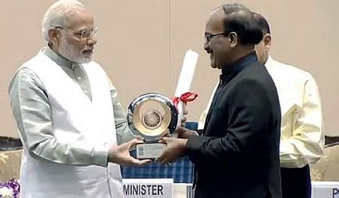 GHMC Commisioner B Janardhan Reddy receiving Prime Minister Award for Excellency from PM Narendra Modi in New Delhi on Saturday  | Express