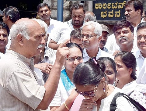 Depositors who lost their savings due to real estate scam by Dreamz Infra proprietor Sachin Nayak protest outside CID office in Bengaluru on Saturday | Pandarinath B