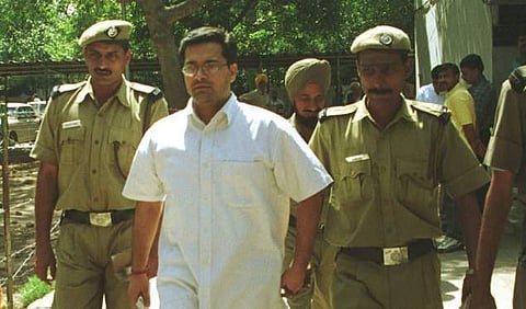 Manu Sharma, the main accused in the Jessica Lal murder case being escorted to Delhi court by police. (File|EPS)