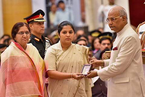 President Ram Nath Kovind presents Shaurya Chakra posthumous to Maj Gosavi Kunal Munnagir being received by his wife and mother during the Defence Investiture Ceremony in New Delhi on Monday. (PTI Photo)