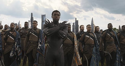 This image released by Disney shows Chadwick Boseman, center, in a scene from Marvel Studios' 'Avengers: Infinity War.' (Marvel Studios via AP)
