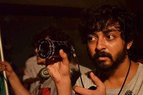 Director Sounak Kar shooting the film. (Image Courtesy Facebook)