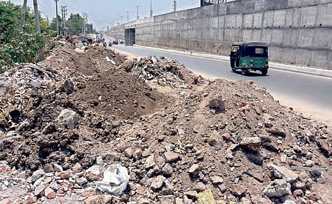 Construction debris dumped at Krishna Lanka in Vijayawada; (below) a busy spot on Sambamurthy Road becomes an eyesore  | p ravindra babu