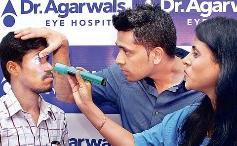 Dr Soosan Jacob, director and chief of Dr Agarwal’s Refractive and Cornea Foundation, and Dr Ashvin Agarwal, Executive Director of Agarwal’s Eye Hospital, examining a patient who underwent the ICRS therapy in the hospital | Nakshatra Krishnamoorthy