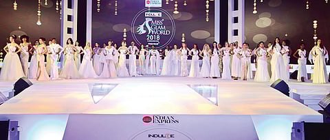 Models walk the ramp at Indulge Miss Glam World pageant at Adlux Convention centre in Angamaly on Friday
