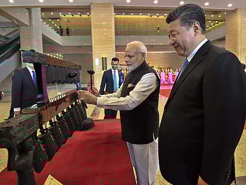 Prime Minister Narendra Modi with Chinese President Xi Jinping visit an exhibition at Hubei Provincial Museum in Wuhan China. | PTI