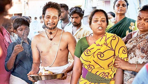 Parents and relatives of G Santhosh during his last rites;