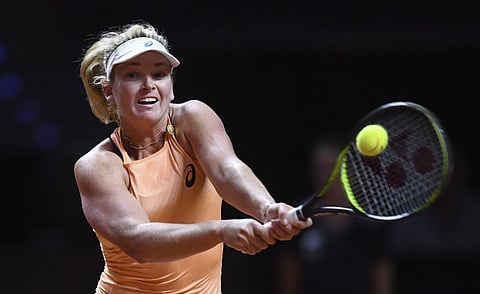 Coco Vandeweghe from the U.S. returns a shot to France’s Caroline Garcia, in their semifinal match of the WTA tennis tournament in Stuttgart, Germany, Saturday, April 28, 2018. | AP