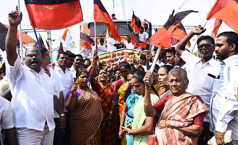 Party members of DMK, Congress and Communist Party staged a rail roko protest at Korukkupet Railway Station. (EPS)