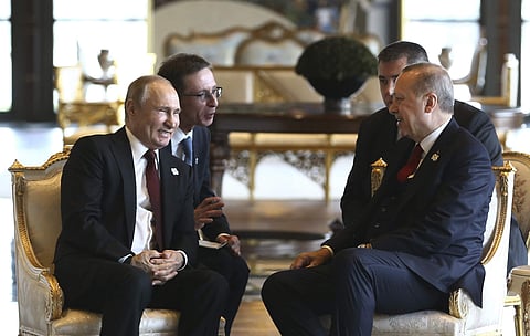 Russian President Vladimir Putin, left, and Turkey's President Recep Tayyip Erdogan speak with help of interpreters during a meeting in Ankara Turkey, Tuesday, April 3, 2018. | Associated Press