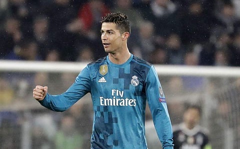 Cristiano Ronaldo celebrates scoring against Juventus | AP