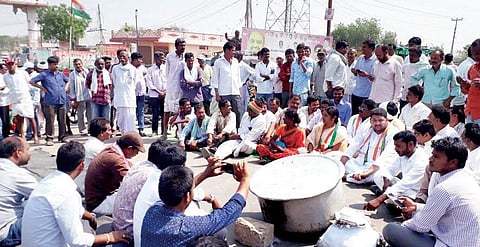 Congress members staging a protest along with public, urging government to stop work on the new aerodrome in Adilabad on Tuesday | Express photo