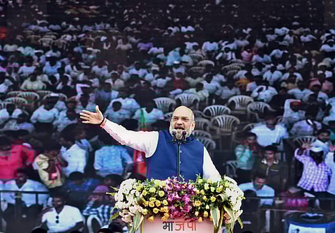 BJP President Amit Shah gestures as he speaks during BJP's 38th Foundation Day celebrations in Mumbai on Friday. | PTI