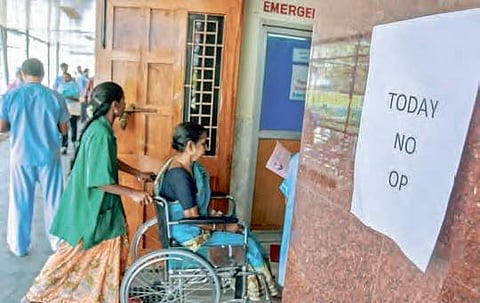 ‘No OP’ sticker pasted on the wall of a private hospital in Vijayawada on Thursday as doctors stayed away from work | P Ravindra Babu