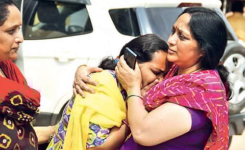 Relatives of Bhavan mourn his death, at Gandhi Hospital in Hyderabad on Friday | sathya keerthi