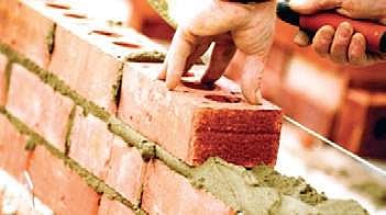 Students make low-cost bricks from debris