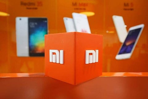 The logo of Xiaomi is seen inside the company's office in Bengaluru (File Photo |Reuters)