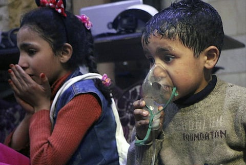 A child receiving oxygen through respirators following an alleged poison gas attack in the rebel-held town of Douma. (Photo | AP)