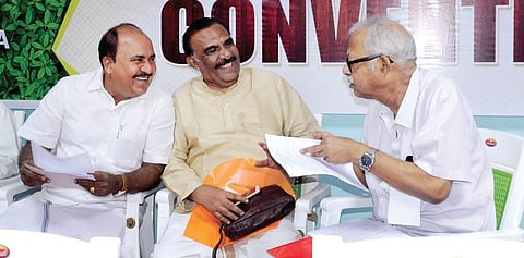 CITU leader Tapan Sen having a word with INTUC state president R Chandrasekharan during the joint national conference of trade unions in Central public sector units in Kochi on Sunday | A SANESH
