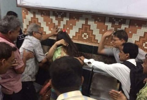 The young boy and girl being beaten up by agitated middle-aged men in Dum Dum metro station in Kolkata. | EPS
