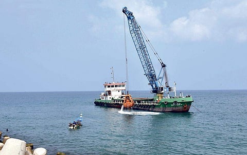 Dredging in progress at Muthalappozhi in T’Puram on Monday | Express