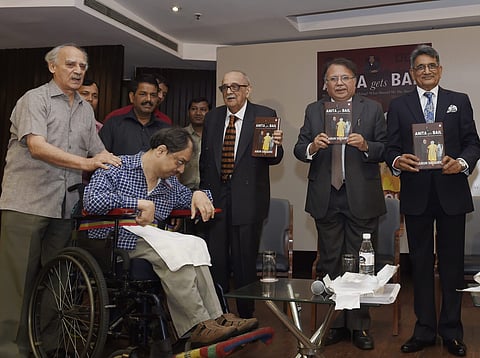 Veteran jurist Fali K Nariman, former CJI Justice retd R M Lodha and former Chief Justice of Delhi High Court Justice retd A P Shah release the new book of Arun Shourie (L) titled 'Anita Gets Bail' in New Delhi on Tuesday. | PTI