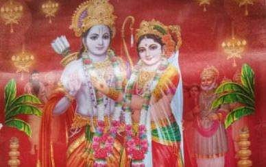 The wedding card was in the shape of a traditionally rolled calender. | Express Photo Services