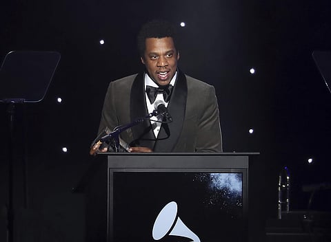 In this Jan. 27, 2018, file photo, honoree Jay-Z speaks onstage at the 2018 Pre-Grammy Gala And Salute To Industry Icons at the Sheraton New York Times Square Hotel in New York. | Associated Press