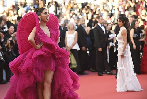 Take a look back at Deepika Padukone's various outfit styles and looks at the 71st Cannes film festival. The Indian film actress made two red carpet appearances at the prestigious event. Deepika Padukone's stylist Shaleena Nathani captioned the actress' l