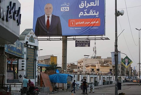 In this Thursday, May 3, 2018 photo, campaign poster of Iraqi Prime Minister Haider al-Abadi in seen in Baghdad, Iraq. | AP