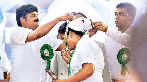Health Minister C Vijaya Basker presenting the award for Best Staff Nurse for the year 2017 during World Nurse Day celebrations in Chennai on Friday | Sunish P Surendran