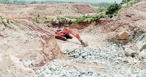 Sri Sai Laxmi construction company crushing the metal at their work site near Gunabadra of Kotturu mandal | EXPRESS