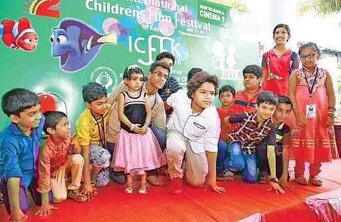 Child artist Ajaz attempting his iconic Pulimurugan pose  at the ICFFK