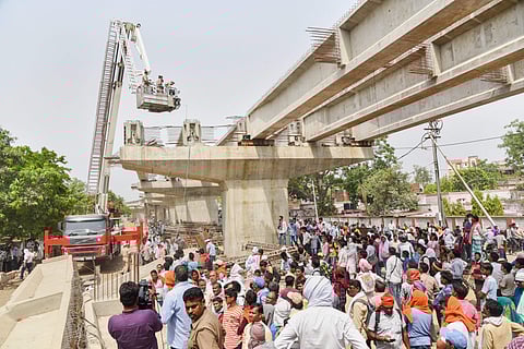 Rescue and relief works in progress at the flyover-collapse site in Varanasi on Wednesday a day after the mishap. | PTI