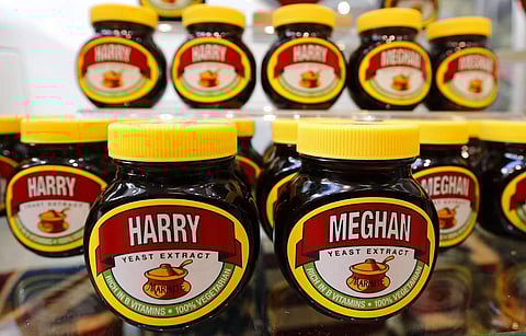 FILE - In this Tuesday, May 15, 2018 file photo Marmite jars with the names of Prince Harry and Meghan Markle on it are photographed on a supermarket shelf in Windsor, England.  | AP