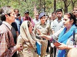 Shail Bala Sharma (extreme right) just before she was shot during the demolition of illegal constructions at Kasuali on Tuesday | EXPRESS