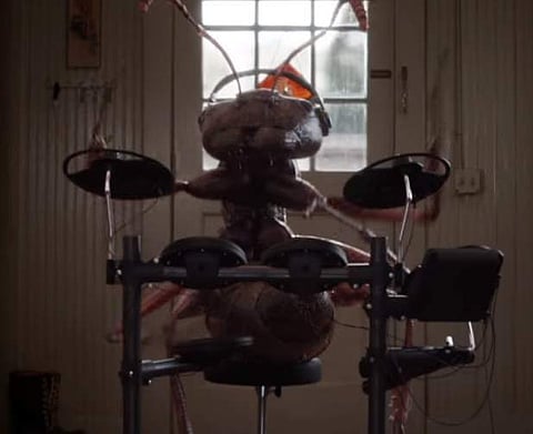 A screengrab from Ant-Man and the Wasp trailer showing an ant playing the drums (YouTube)
