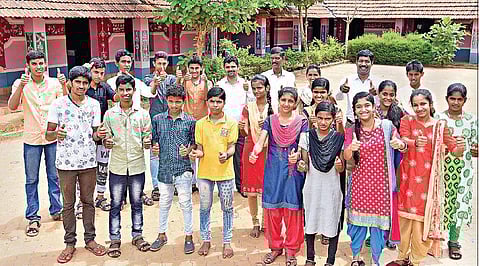 In-charge HM Jagannath (last row second from right) with students and  teachers of Nammura Shaale I Rajesh Shetty Ballalbagh