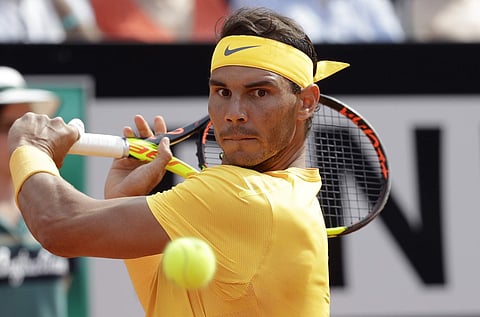 Rafael Nadal returns the ball to Alexander Zverev during their final match at the Italian Open in Rome. | AP
