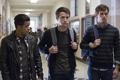 This image released by Netflix shows, from left, Christian Navarro, Dylan Minnette and Brandon Flynn in '13 Reasons Why.' | Associated Press