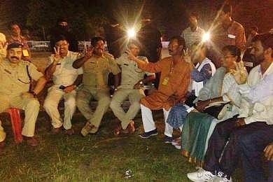 Police officials and Trinamool Congress leaders show victory sign in Raiganj in Jalpaiguri district of West Bengal. (Photo | Express Photo Service)