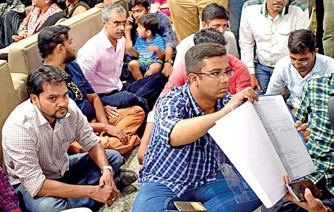 Parents protest against textbook prices at Baldwin Girls’ High School on Tuesday | Pandarinath B