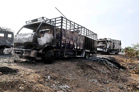 File- Farmers' agitation turns violent as they torch trucks at Mhow-Neemuch Highway in Mandsaur district (PTI)