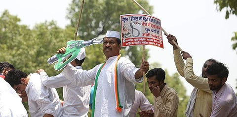 The Congress today hit out at the Narendra Modi government on the completion of its four years in power, accusing it of betraying the people of the country and not fulfilling the promises the ruling BJP had made to them. (IN PIC: Youth Congress workers pr
