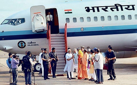 Prime Minister narendra Modi being greeted at the Bhubaneswar Airport by Governor Satya Pal Malik on Saturday | Irfana
