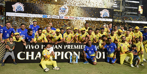CSK players celebrate with the IPL 2018 trophy after winning the final match against SRH in Mumbai | PTI